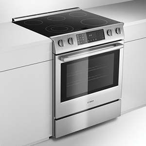 Modern Bosch range with smooth cooktop and digital control panel, built for efficiency and style