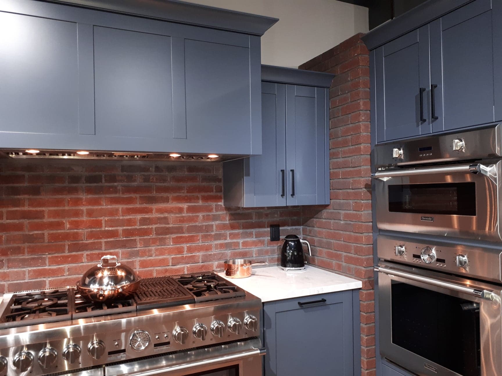 avenue appliance brick and blue kitchen